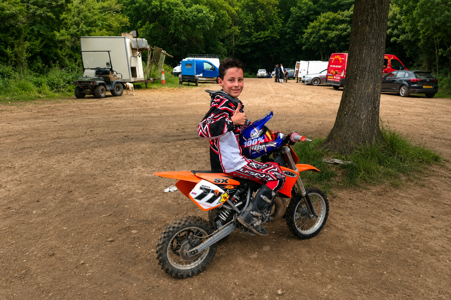 Young Kieran Smith sitting on his first motocross bike with gears and a clutch