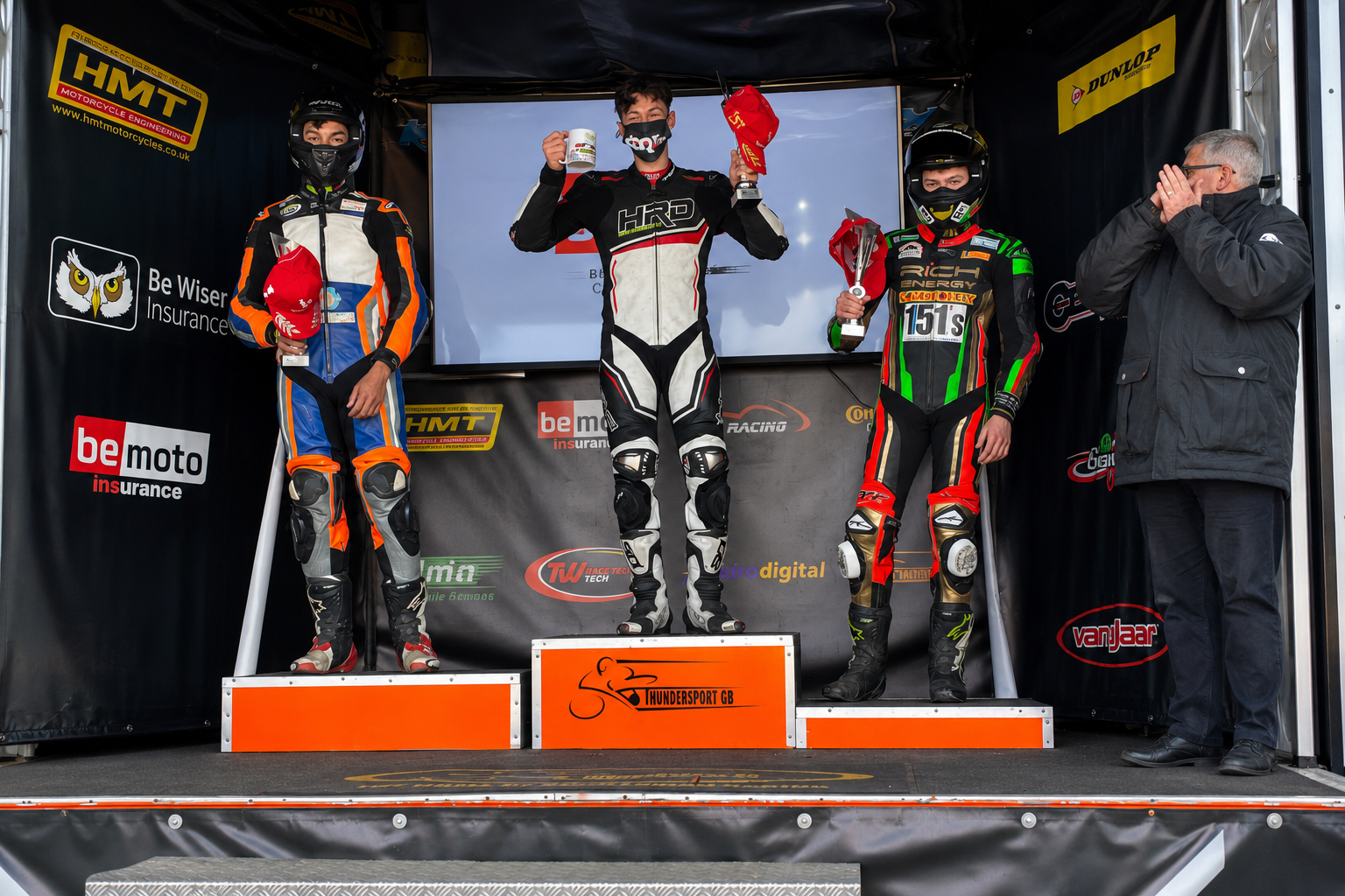 Kieran Smith celebrating his first Thundersport GB race win on the top step of the podium in 2021