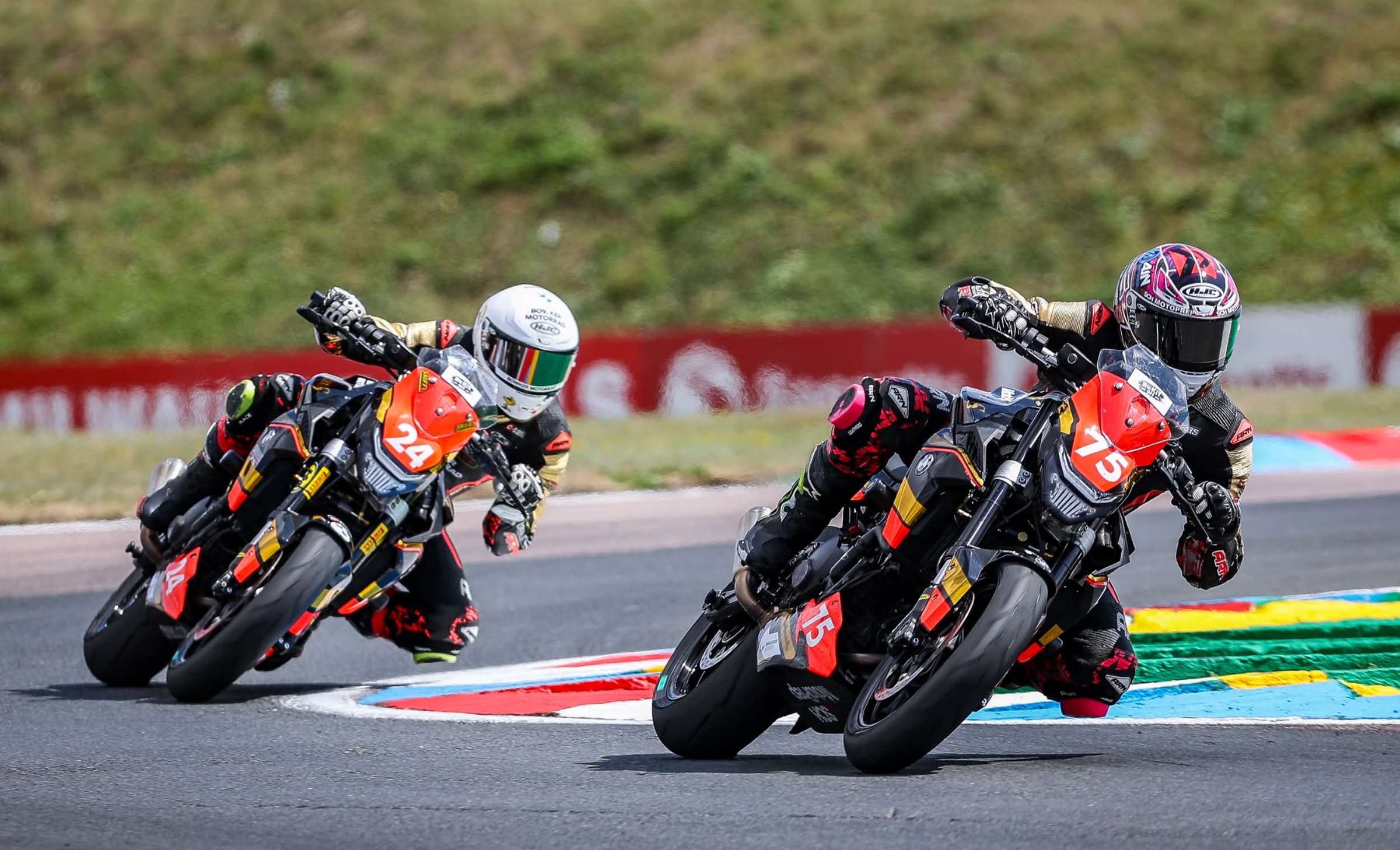 Smith Twins riders racing through a corner