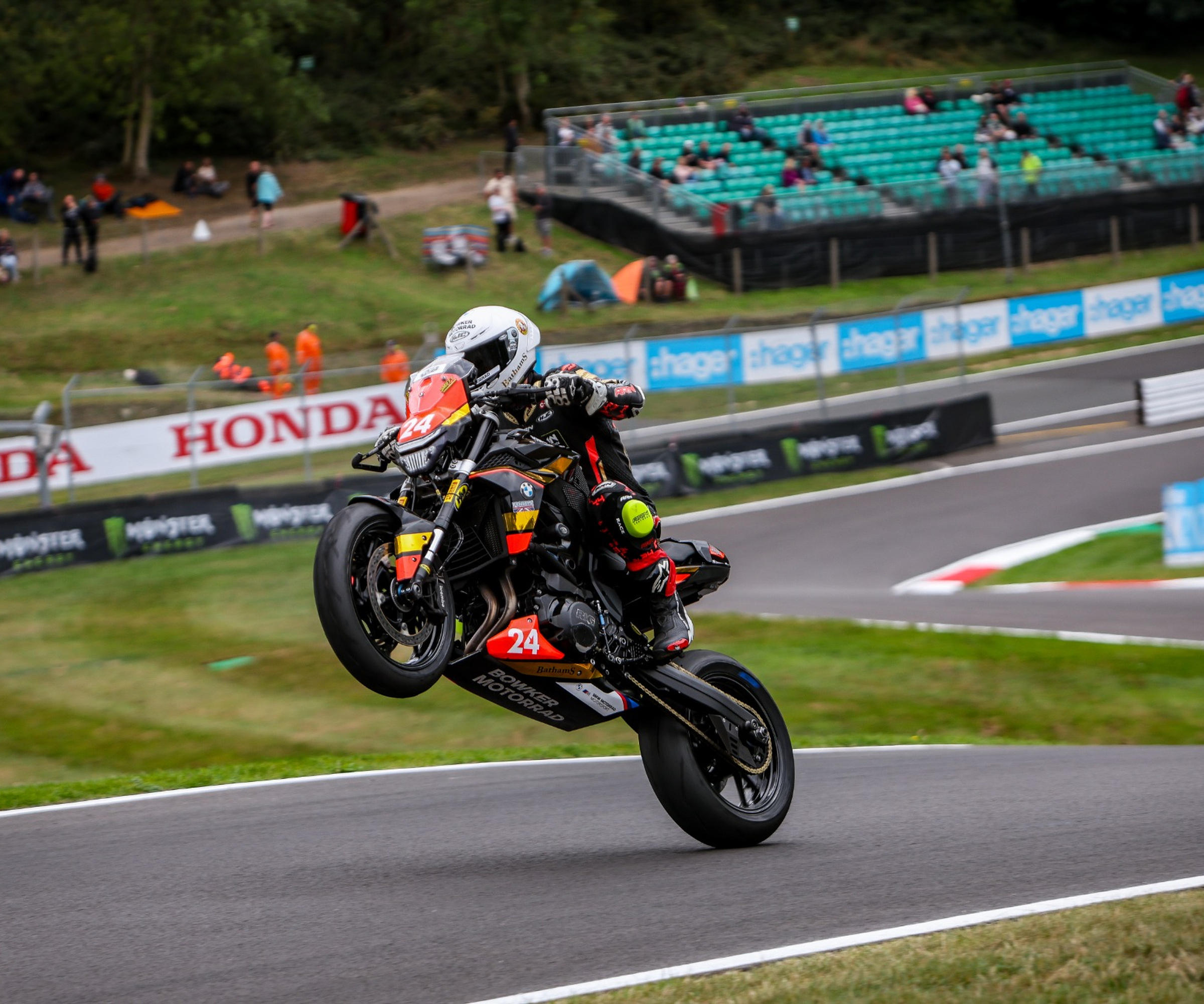 Smith Twins rider doing a wheelie at Cadwell
