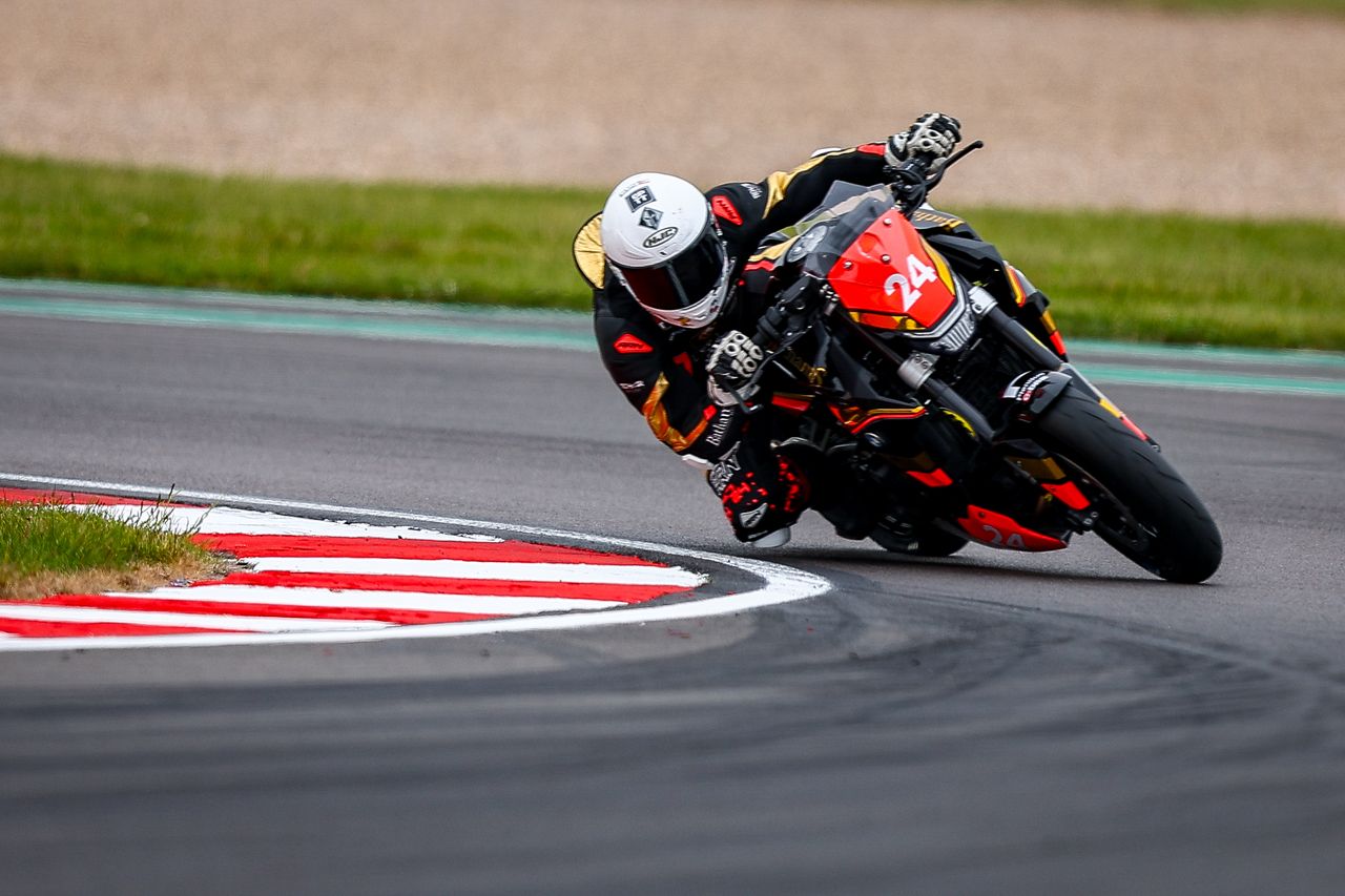 Smith Twins rider leaned over through a circuit corner